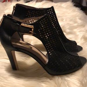 Black leather peep toe heels